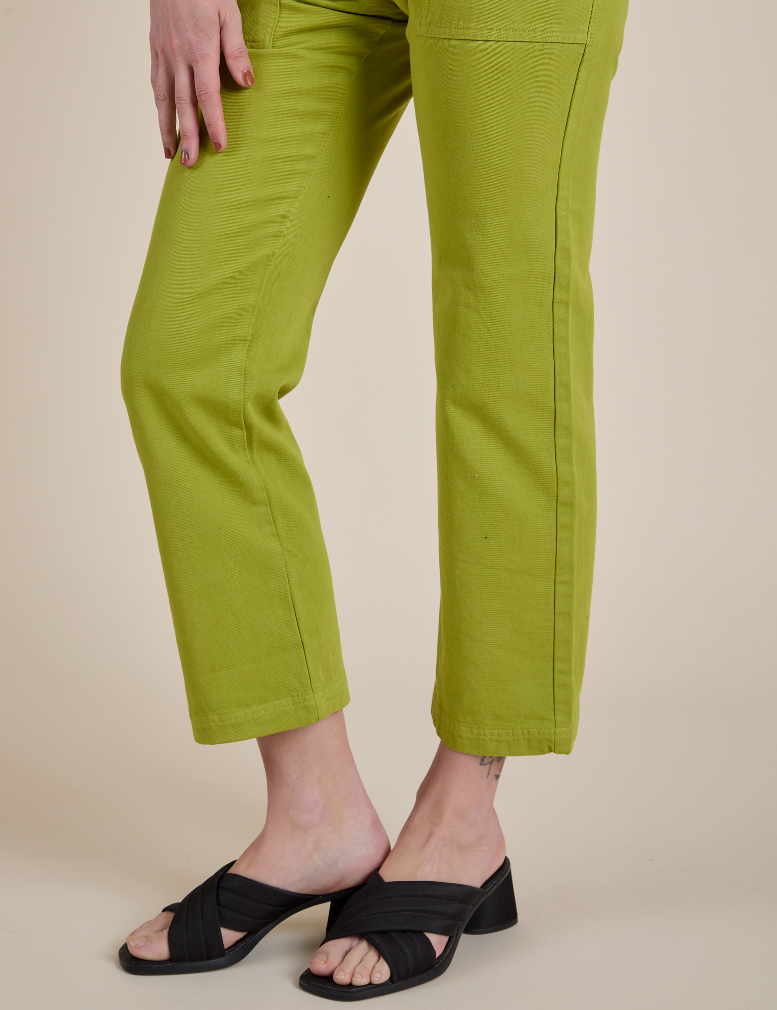 Work Pants in Gross Green pant leg close up on Alex