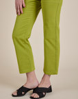 Work Pants in Gross Green pant leg close up on Alex