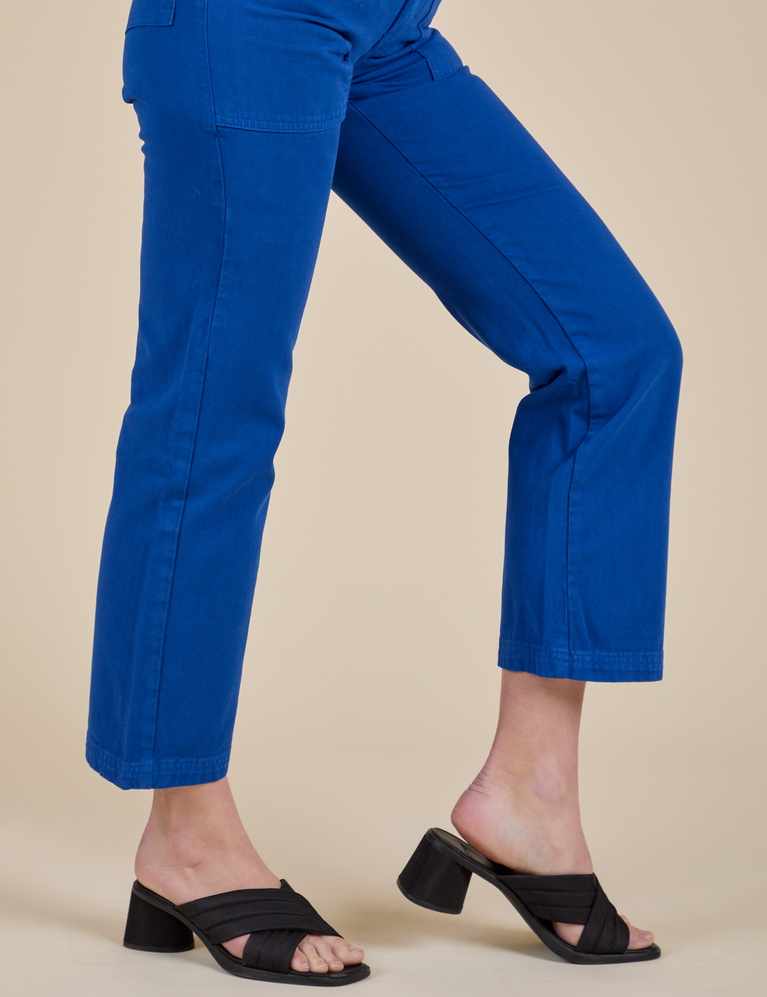 Work Pants in Royal Blue pant leg side view close up on Alex