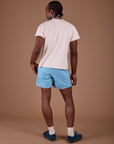 Back view of Classic Work Shorts in Baby Blue and vintage off white Organic Vintage Tee on Jerrod