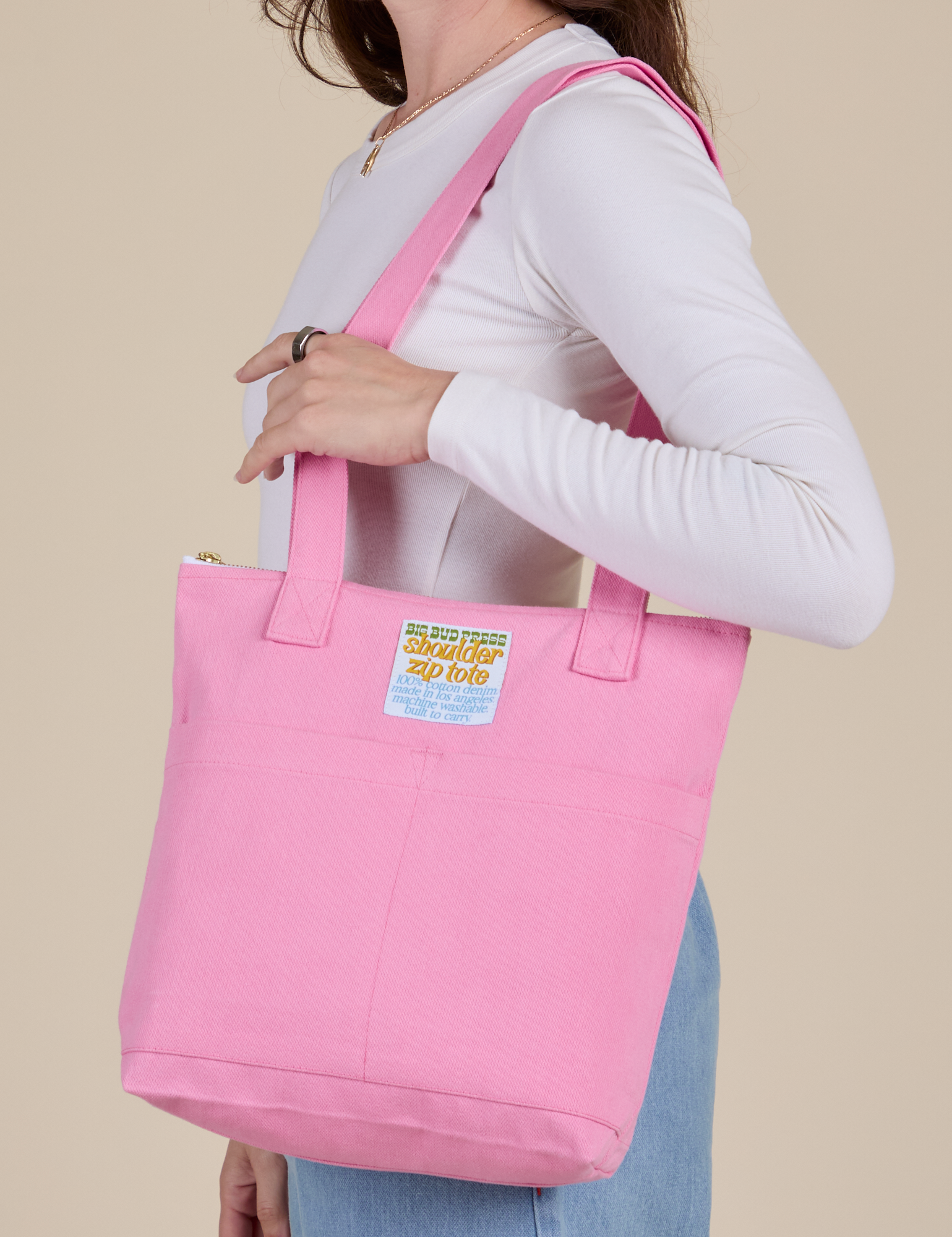 Over-Shoulder Zip Mini Tote in Bubblegum worn over shoulder of model