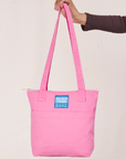 Over-Shoulder Zip Mini Tote in Bubblegum Pink held by model