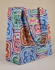 Angled view of Butterfly Kaleidoscope Shopper Tote