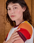 Calypso Tee in Desert sleeve close up on Alex