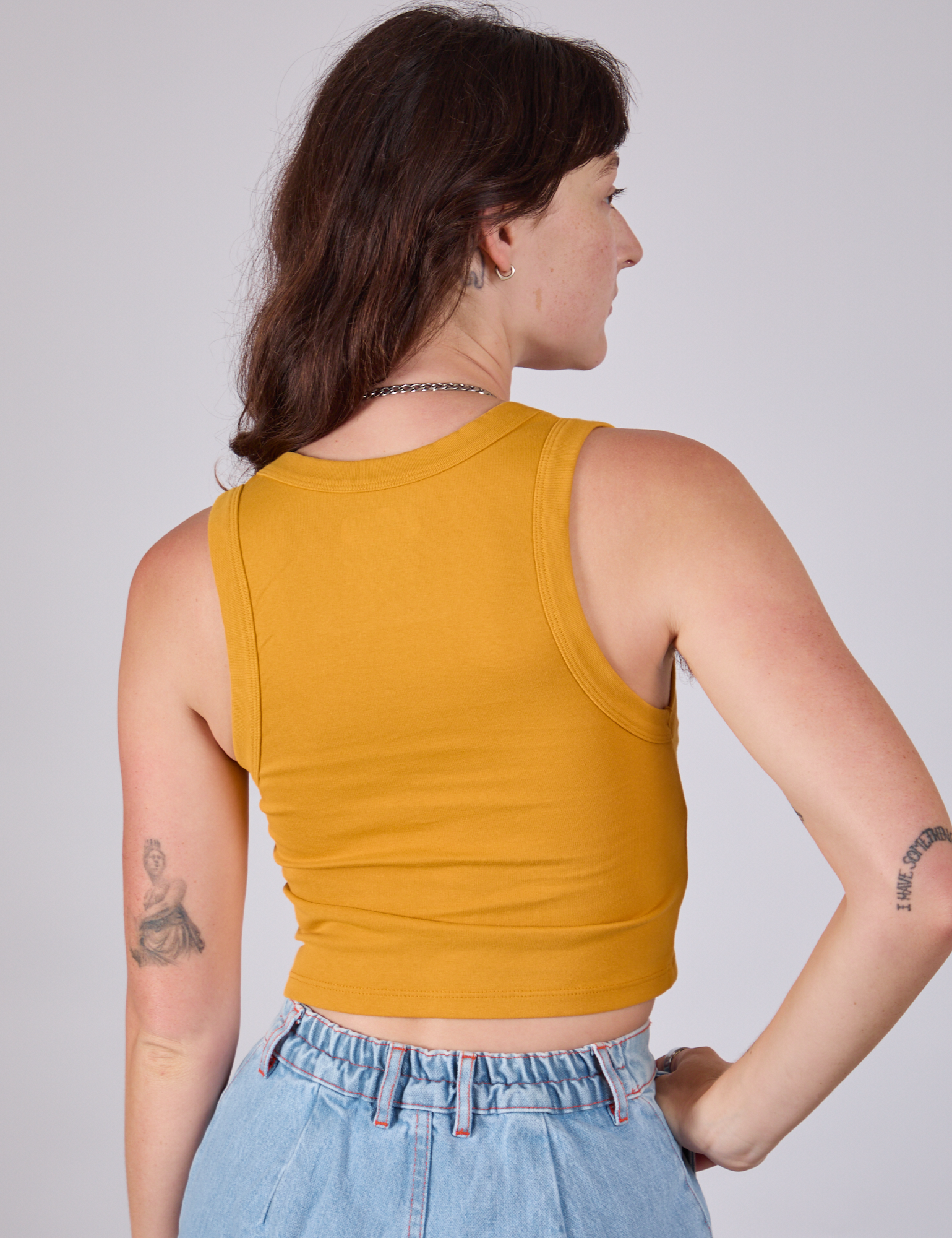 Cropped Tank Top in Mustard Yellow back view on Alex