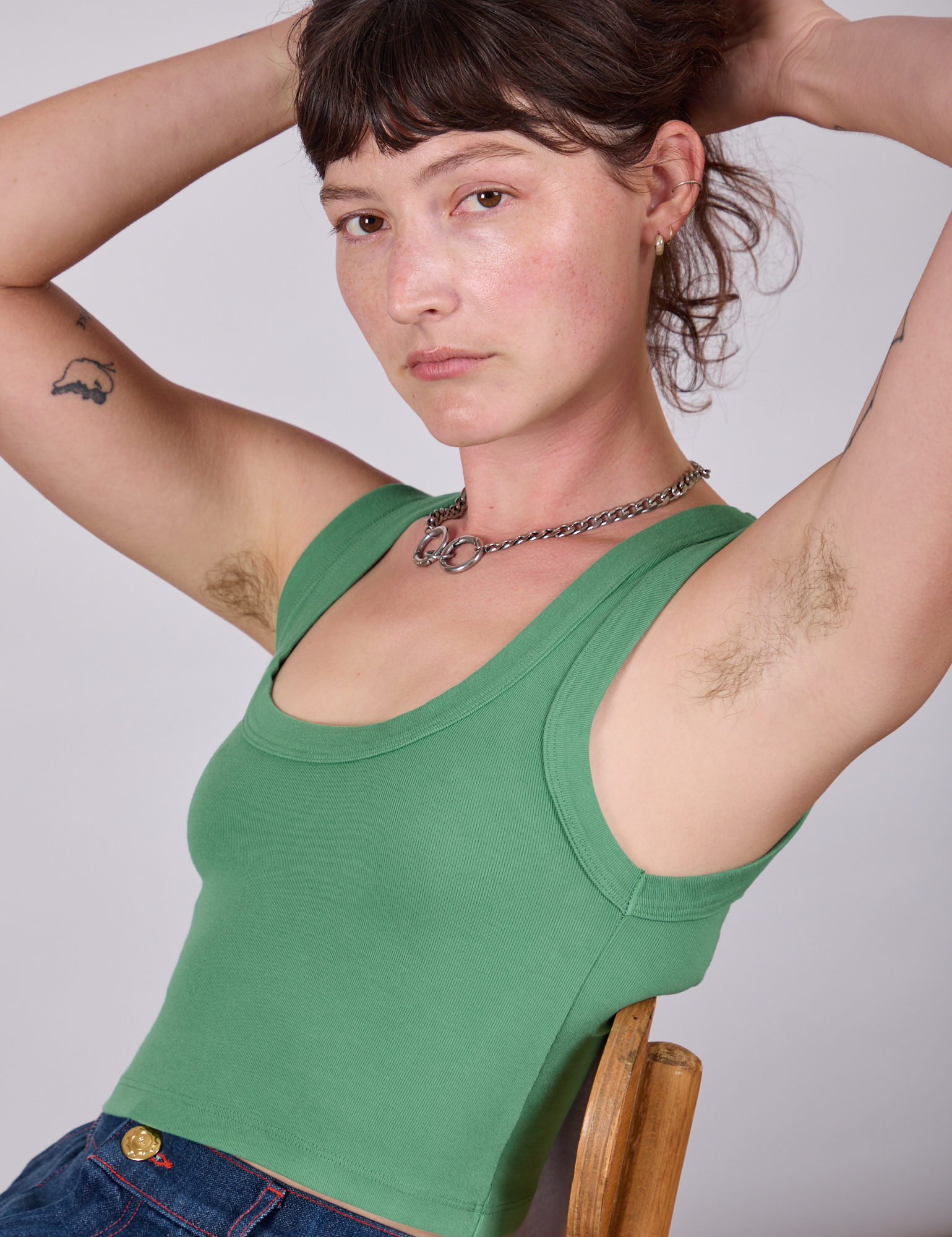 Cropped Tank Top in Seafoam Green angled front view on Alex