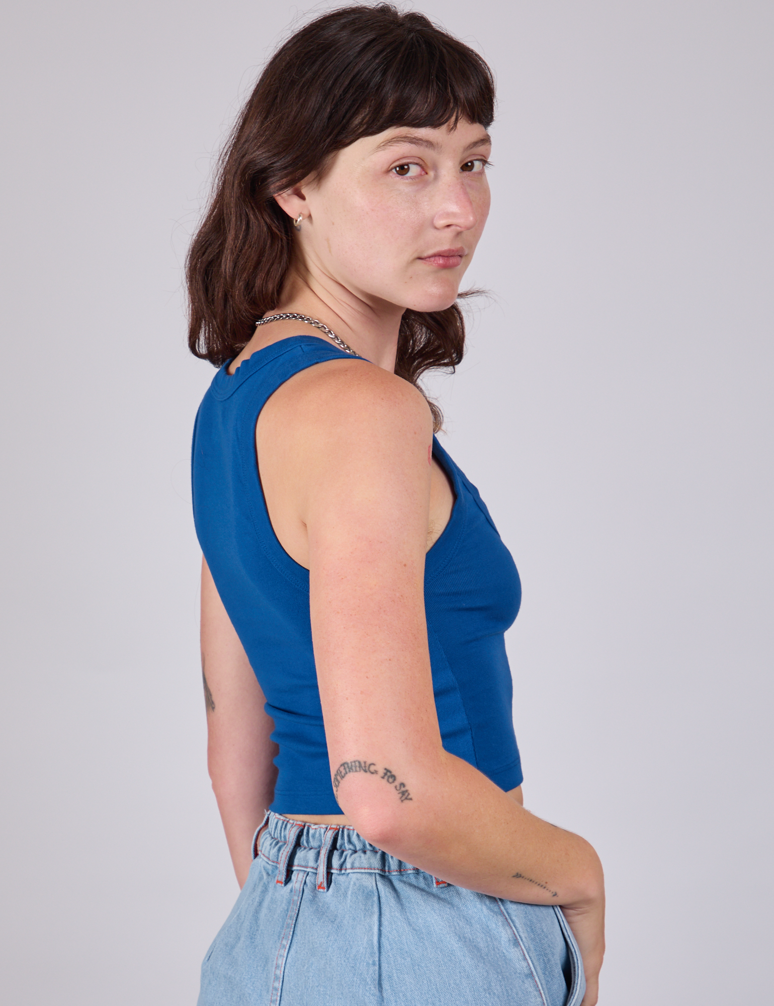 Cropped Tank Top in Royal Blue side view on Alex