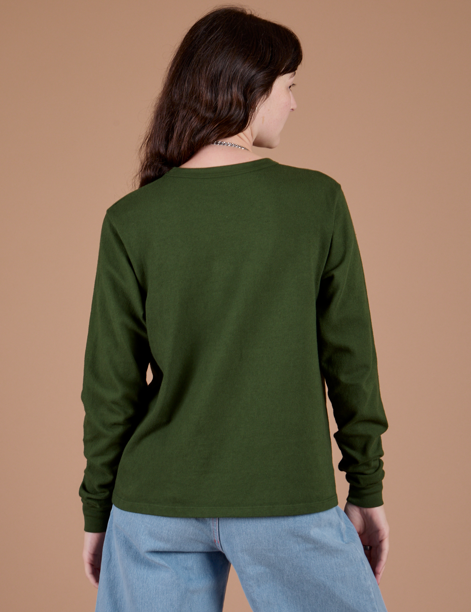 Long Sleeve Burly Tee in Evergreen back view on Alex