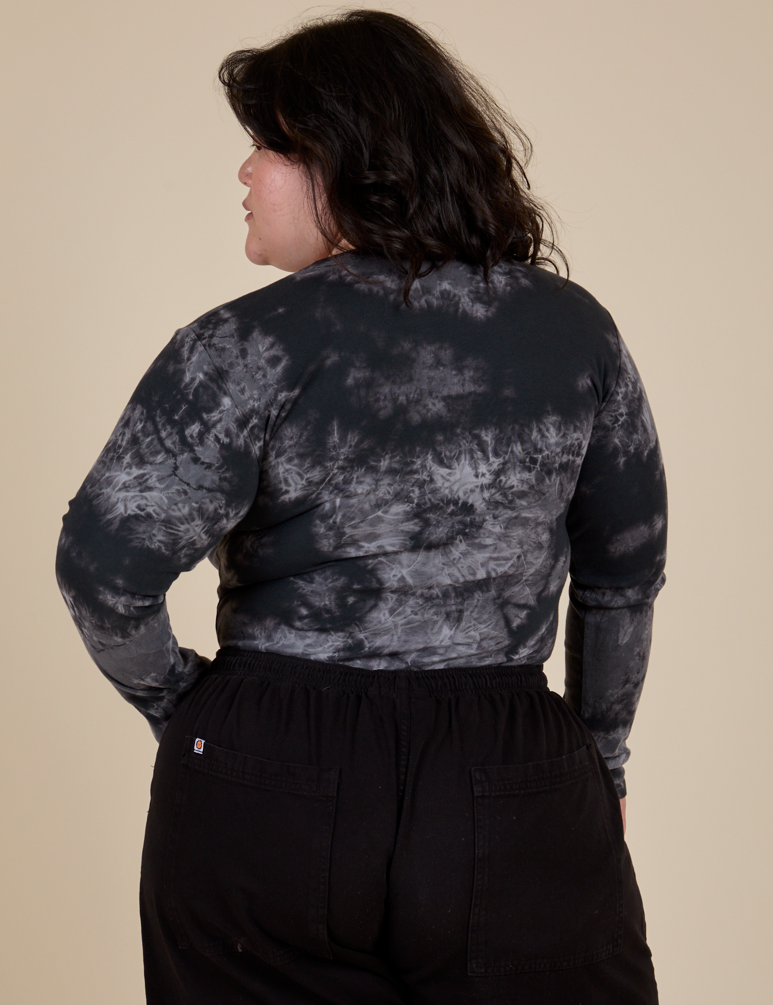 Long Sleeve Baby Tee in Black Magic Waters back view on Ashley