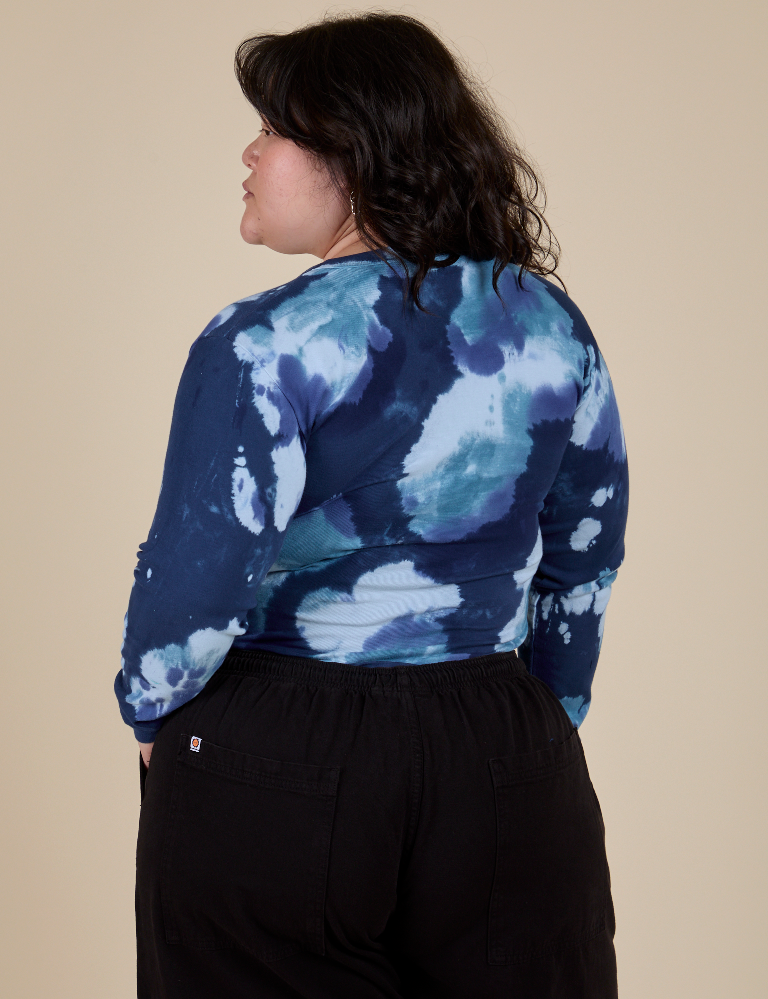 Long Sleeve Baby Tee in Blue Magic Waters back view on Ashley