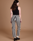 Back view of Black Stripe Work Pants in White on Alex