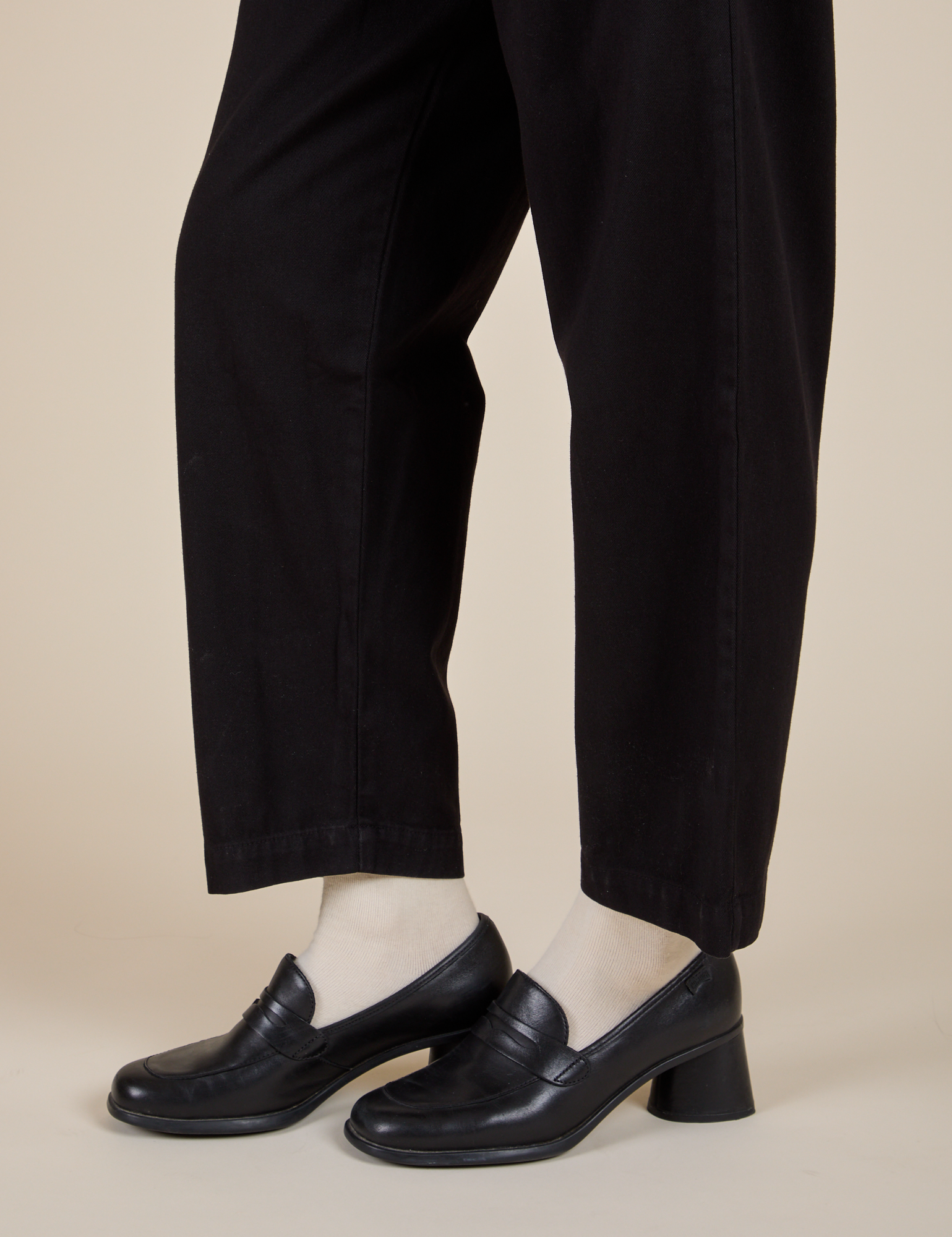 Pant leg side view close up of Heavyweight Trousers in Basic Black on Alex