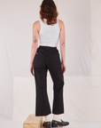 Back view of Action Pants in Basic Black and Cropped Tank in vintage tee off-white