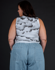 Back view of Kristen in the Dark Cloud Airbrush Muscle Tee