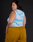 Angled back view of the Morning Moon Airbrush Muscle Tee on Kristen