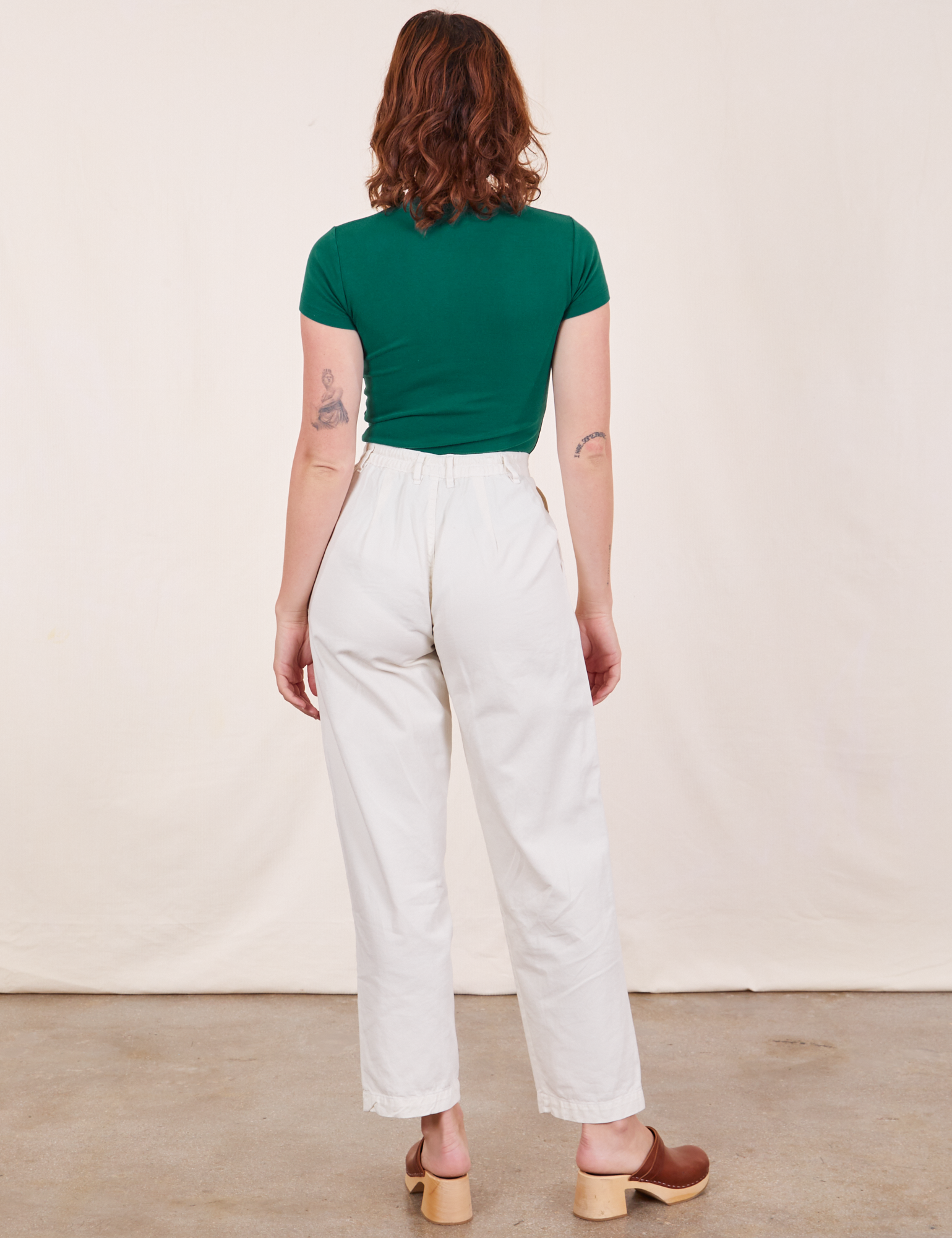 Back view of Baby Tee in Hunter Green and vintage off-white Heavy Weight Trousers