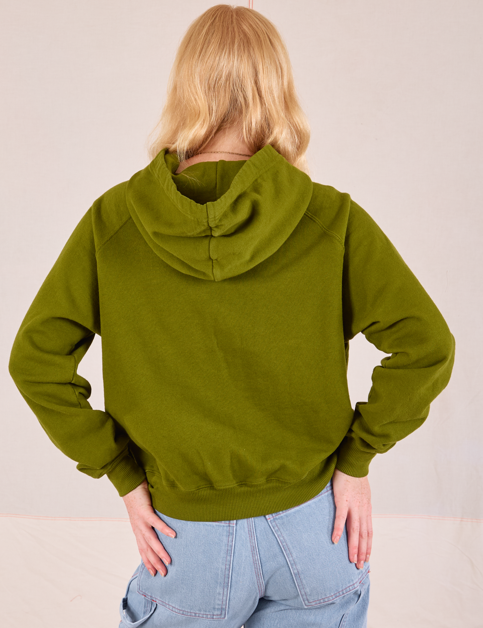 Collegiate Hoodie in Summer Olive back view on Margaret