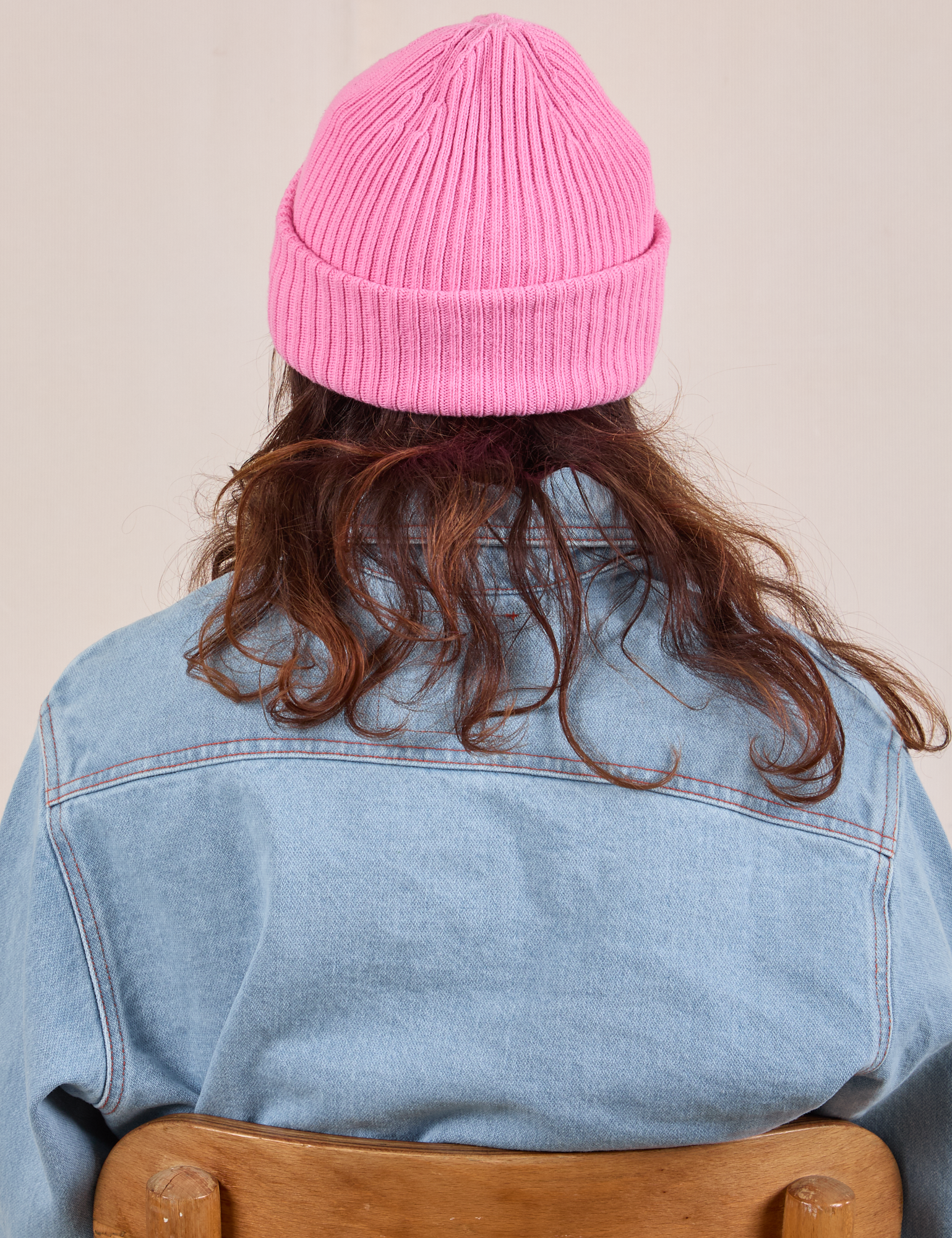 Back view of Ribbed Beanie in Bubblegum Pink worn by Alex