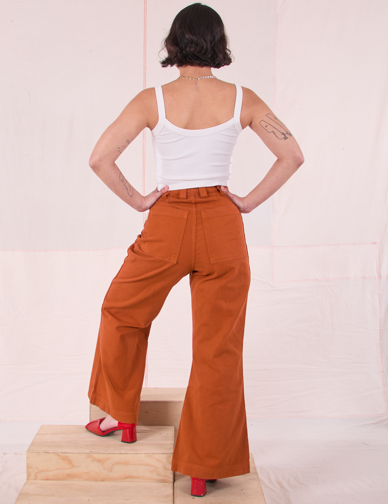 Bell Bottoms in Burnt Terracotta and Cami in Vintage Tee Off-White back view on Soraya