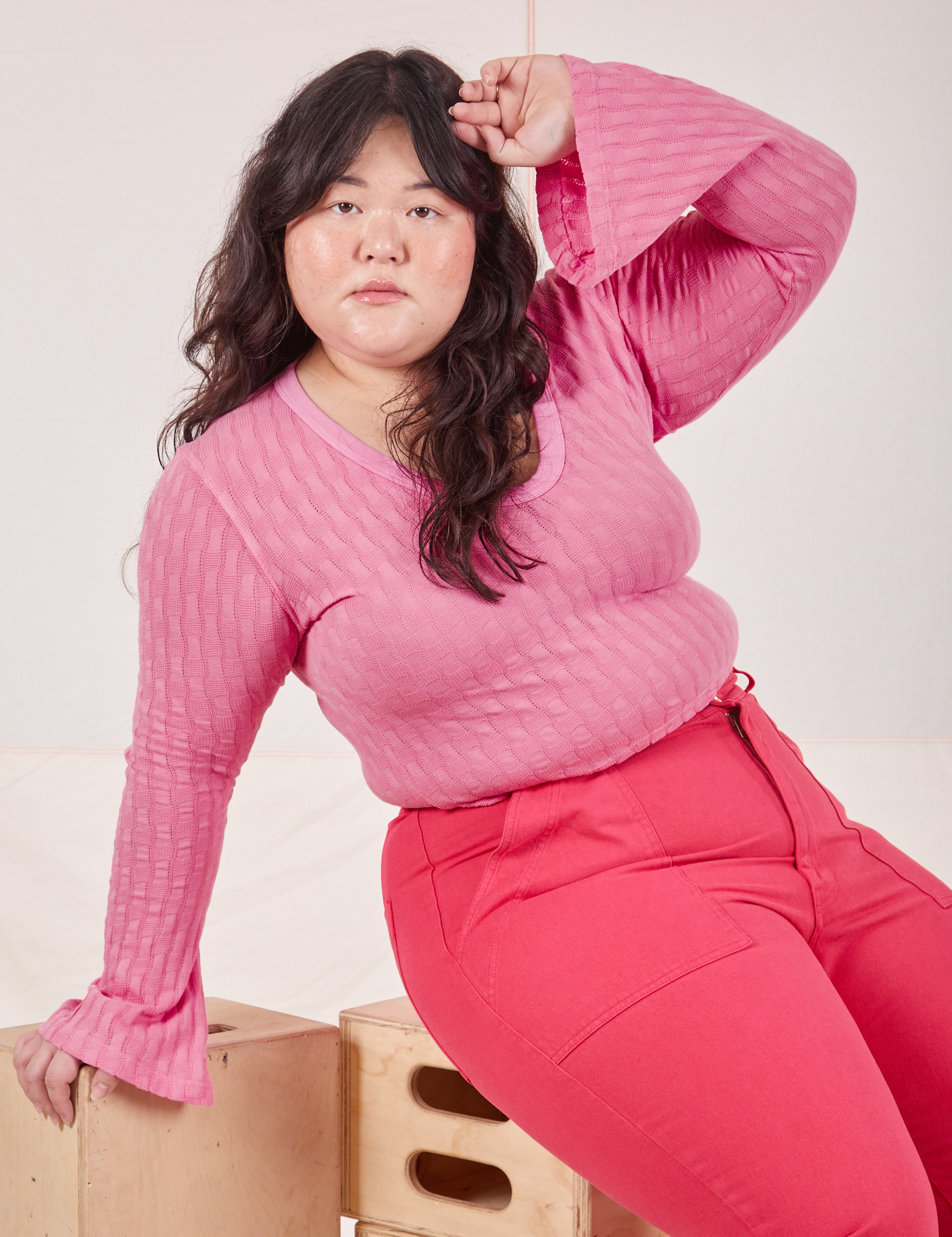 Ashley is wearing Bell Sleeve Top in Bubblegum Pink and hot pink Work Pants