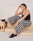 Tiara is wearing Wide Leg Trousers in Big Gingham and black Cropped Cami