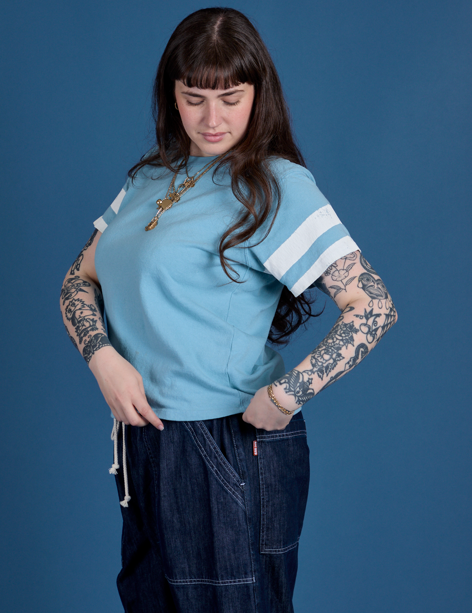 Painted Burly Tee in Baby Blue angled front view on Sydney