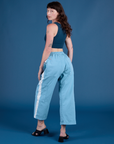 Painted Drop Pocket Cargo Pants in Baby Blue angled back view on Alex
