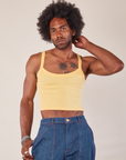 Jerrod is 6’3” and wearing S Cropped Cami in Butter Yellow