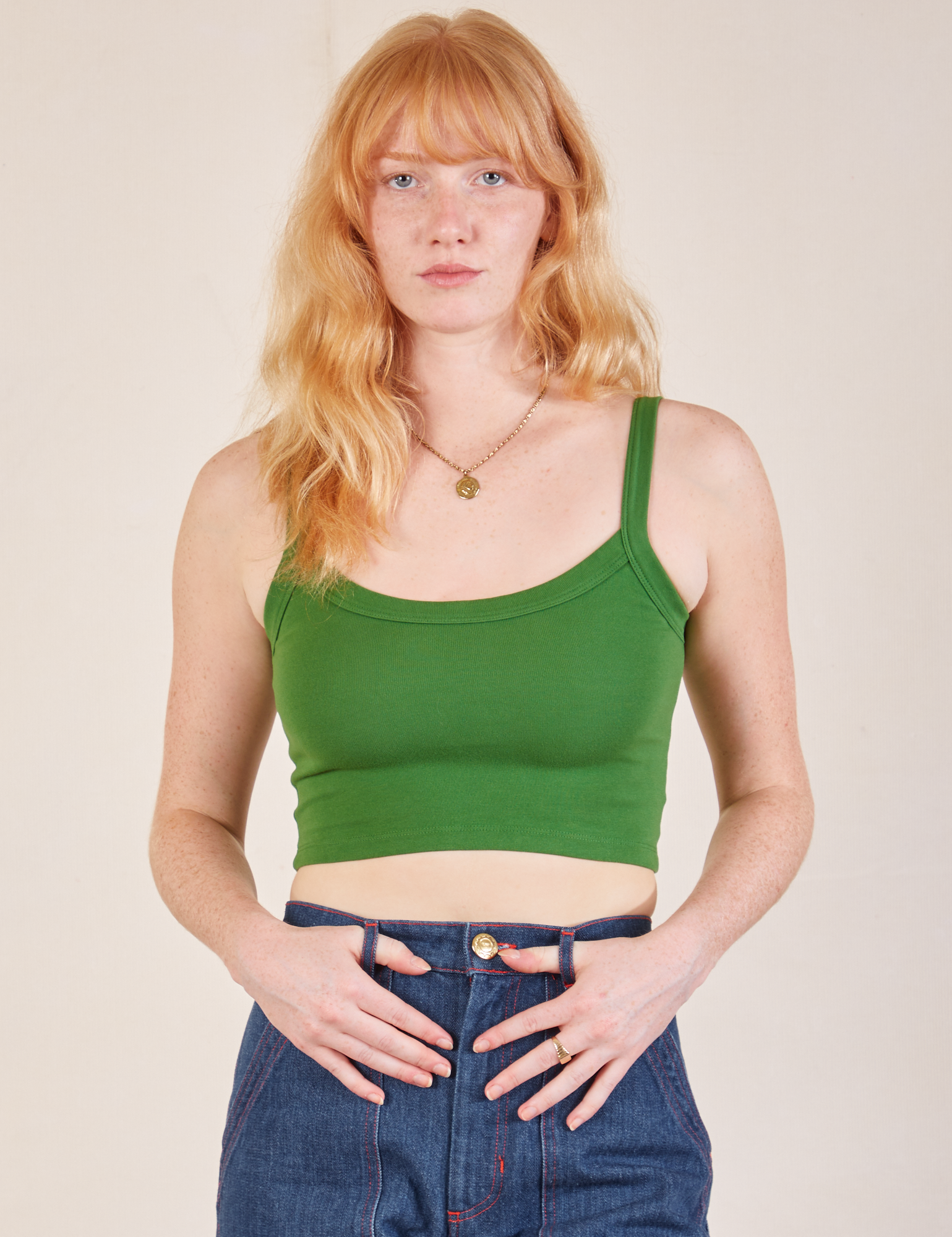 Margaret is 5’11” and wearing P Cropped Cami in Lawn Green