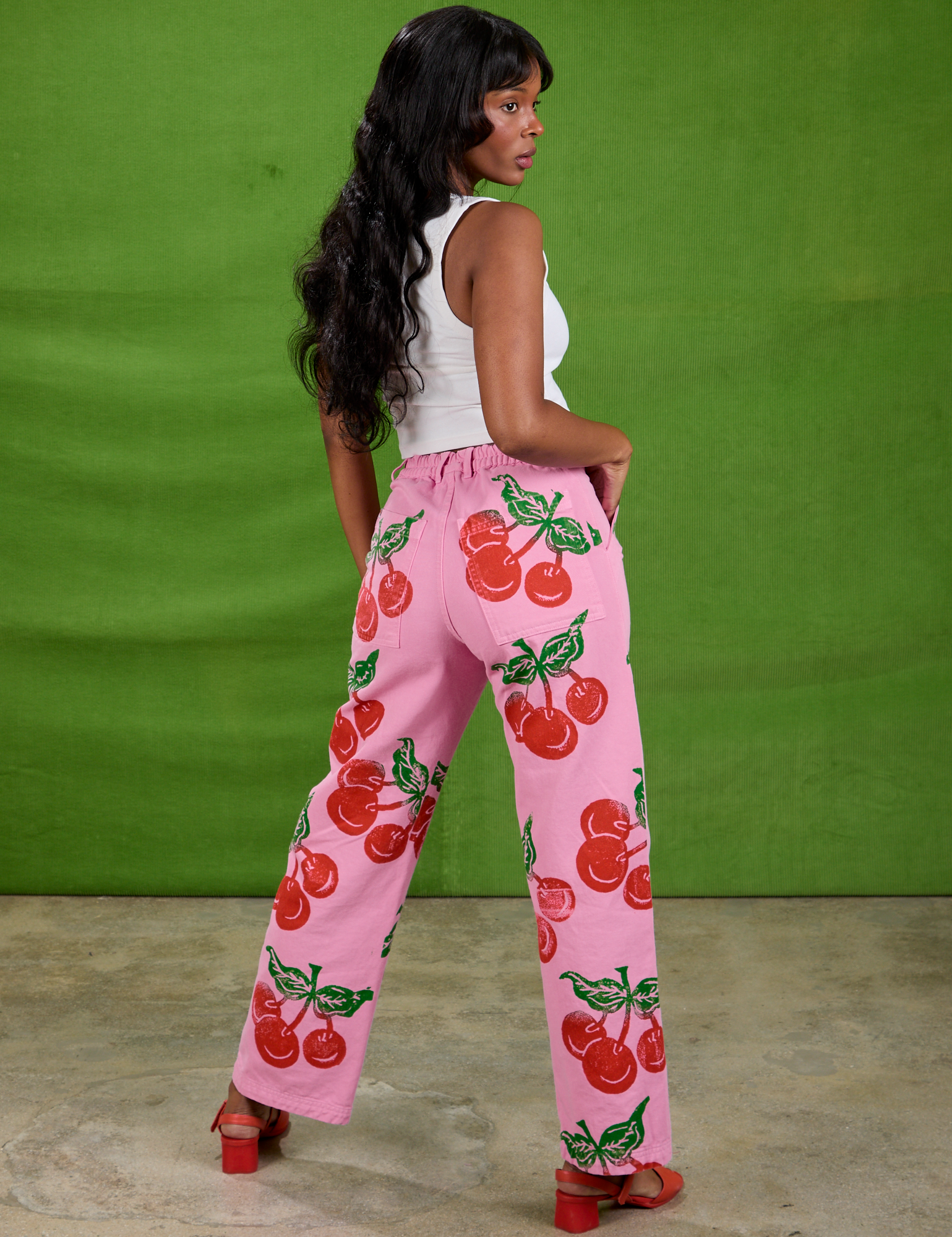 Cherry Paintstamped Work Pants in Bubblegum Pink back view on Kandia