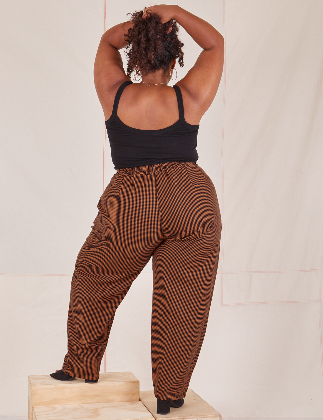 Back view of Checker Trousers in Brown and black Cropped Cami on Morgan