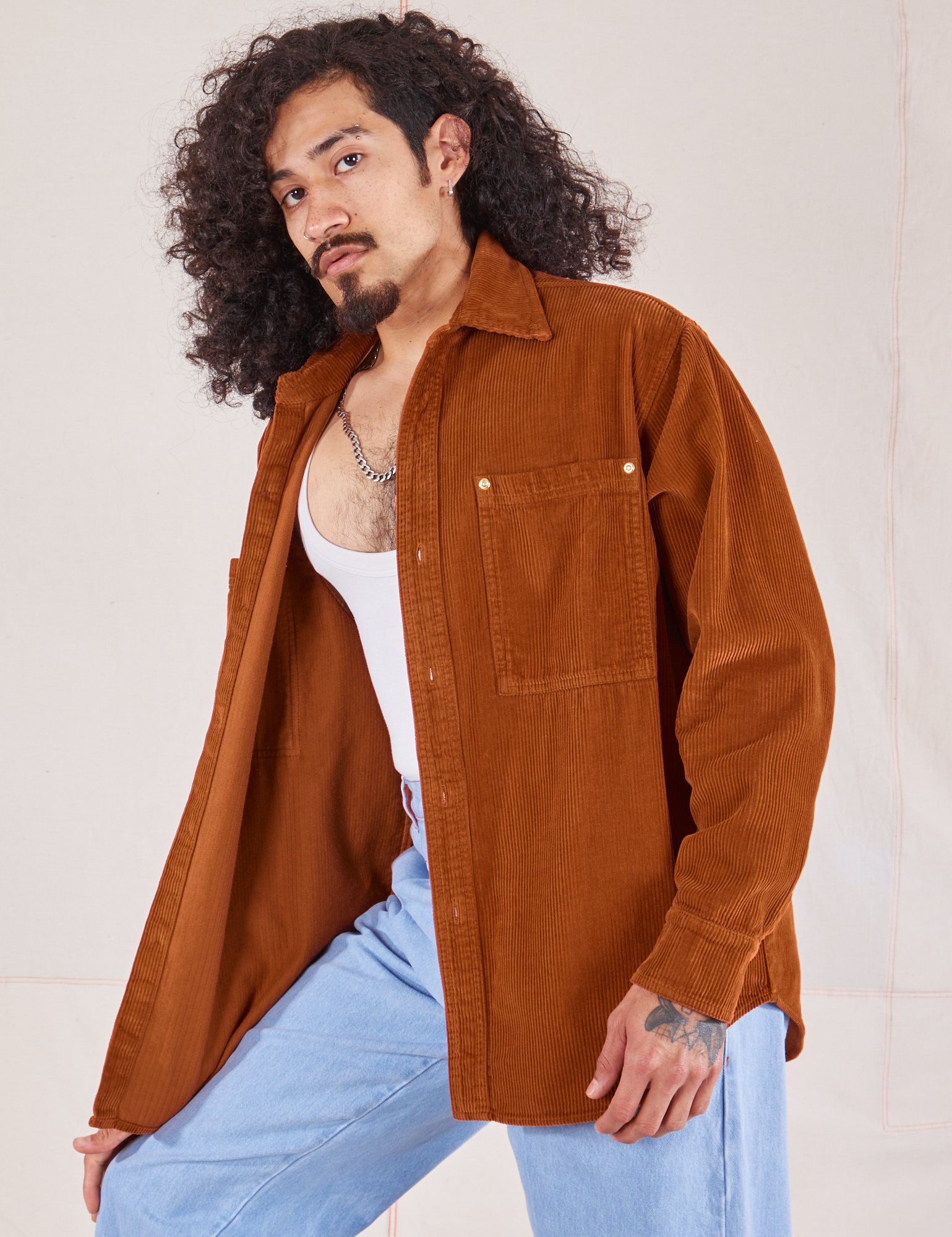 Angled front view of Corduroy Overshirt in Burnt Terracotta on Jesse