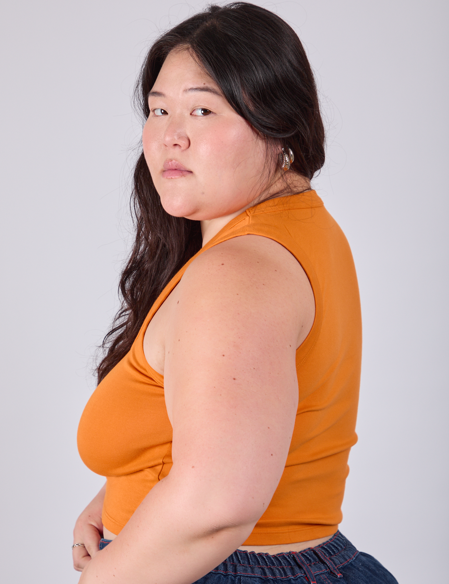 Cropped Tank Top in Creamsicle Orange side view on Ashley