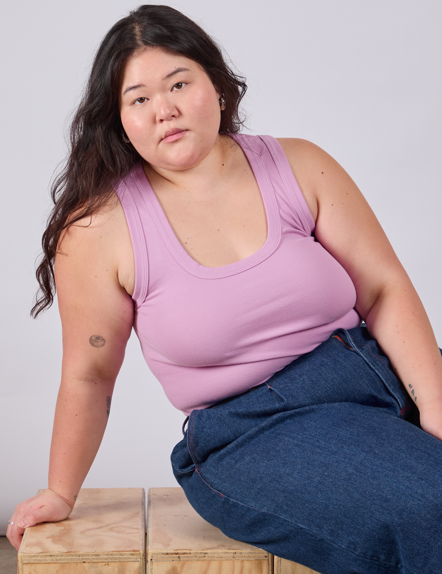 Ashley is wearing Cropped Tank Top in Lilac