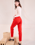 Easy Pants in Mustang Red angled back view on Alex