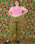 Marielana is wearing Work Pants in Flower Tangle and bubblgum pink Cropped Tank Top