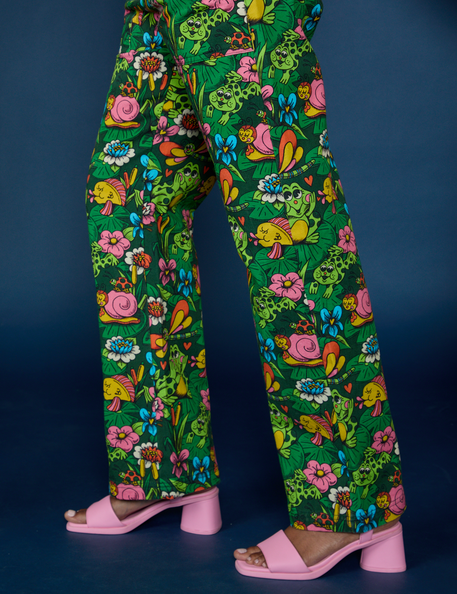 Side view pant leg close up of Pond Party Print Jumpsuit on Kandia