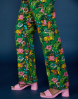 Side view pant leg close up of Pond Party Print Jumpsuit on Kandia