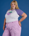 Angled front view of Produce Raglan Tee in Grape on Juliet