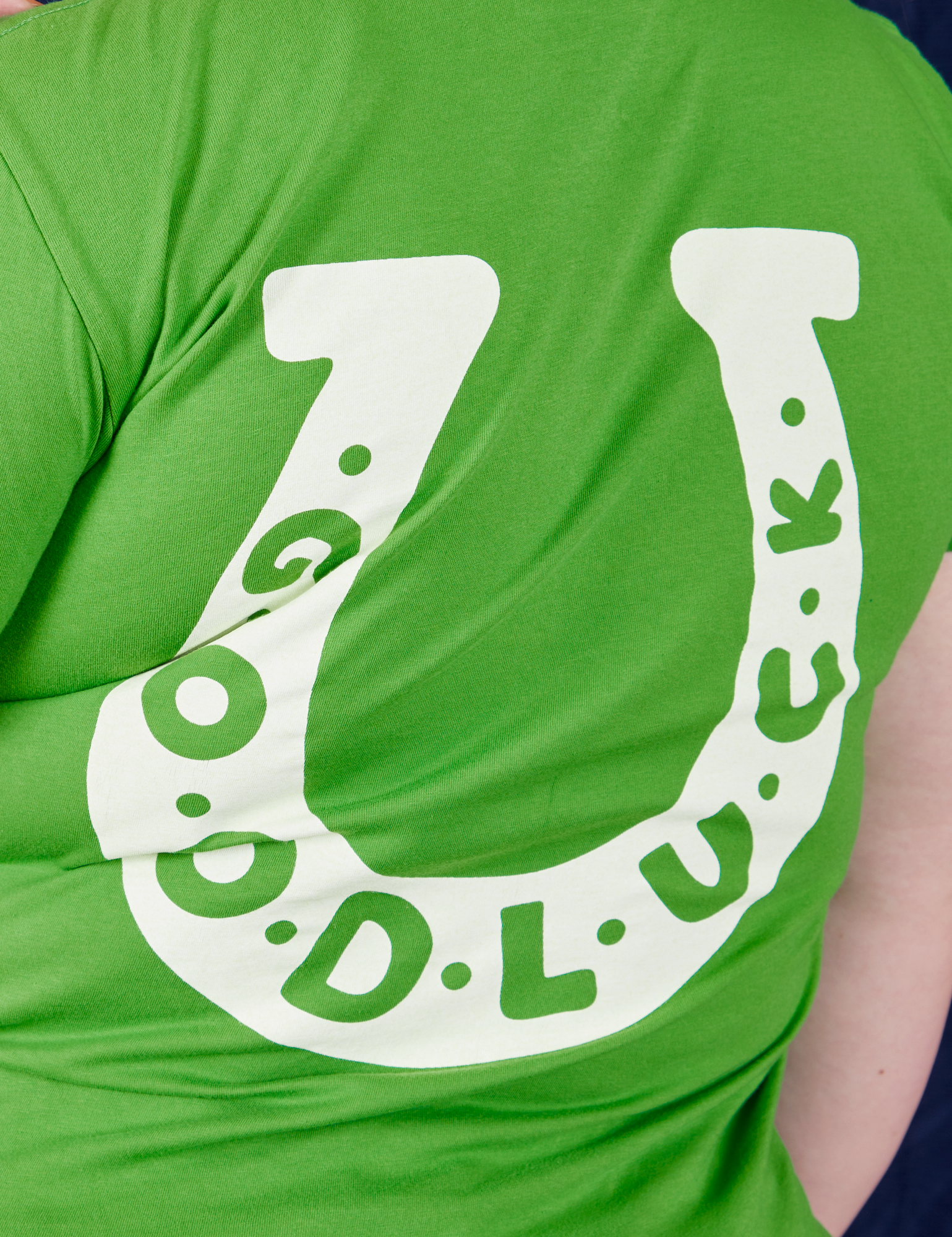 Back close up of Luck Tee on Ashley