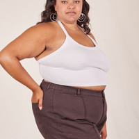 Angled side view of Halter Top in Vintage Off-White and espresso Western Pants worn by Alicia