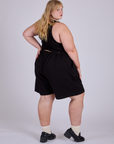 Pleated Trouser Shorts in Basic Black back front view on Juliet