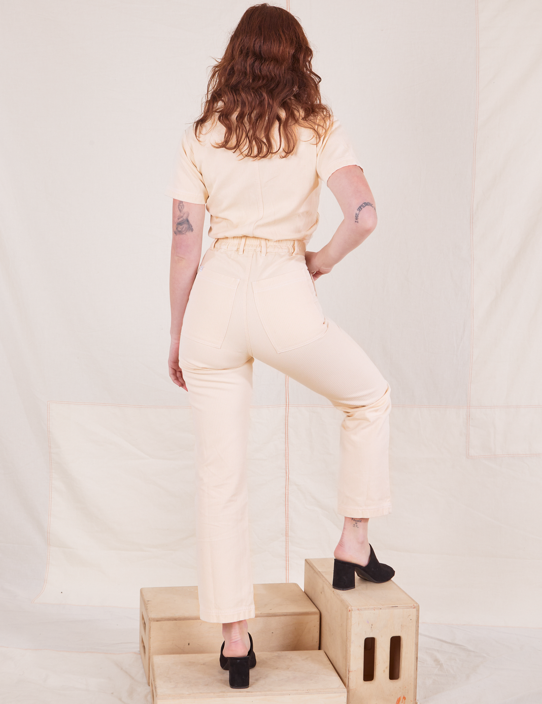 Back view of Heritage Short Sleeve Jumpsuit in Natural on Alex