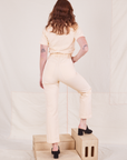 Back view of Heritage Short Sleeve Jumpsuit in Natural on Alex