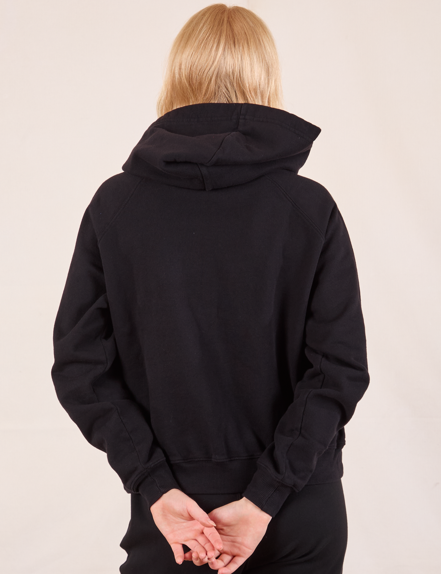 Oversized Hoodie in Basic Black back view on Margaret