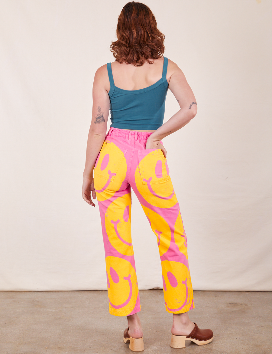 Back view of Icon Work Pants in Smilies and marine blue Cropped Cami worn by Alex