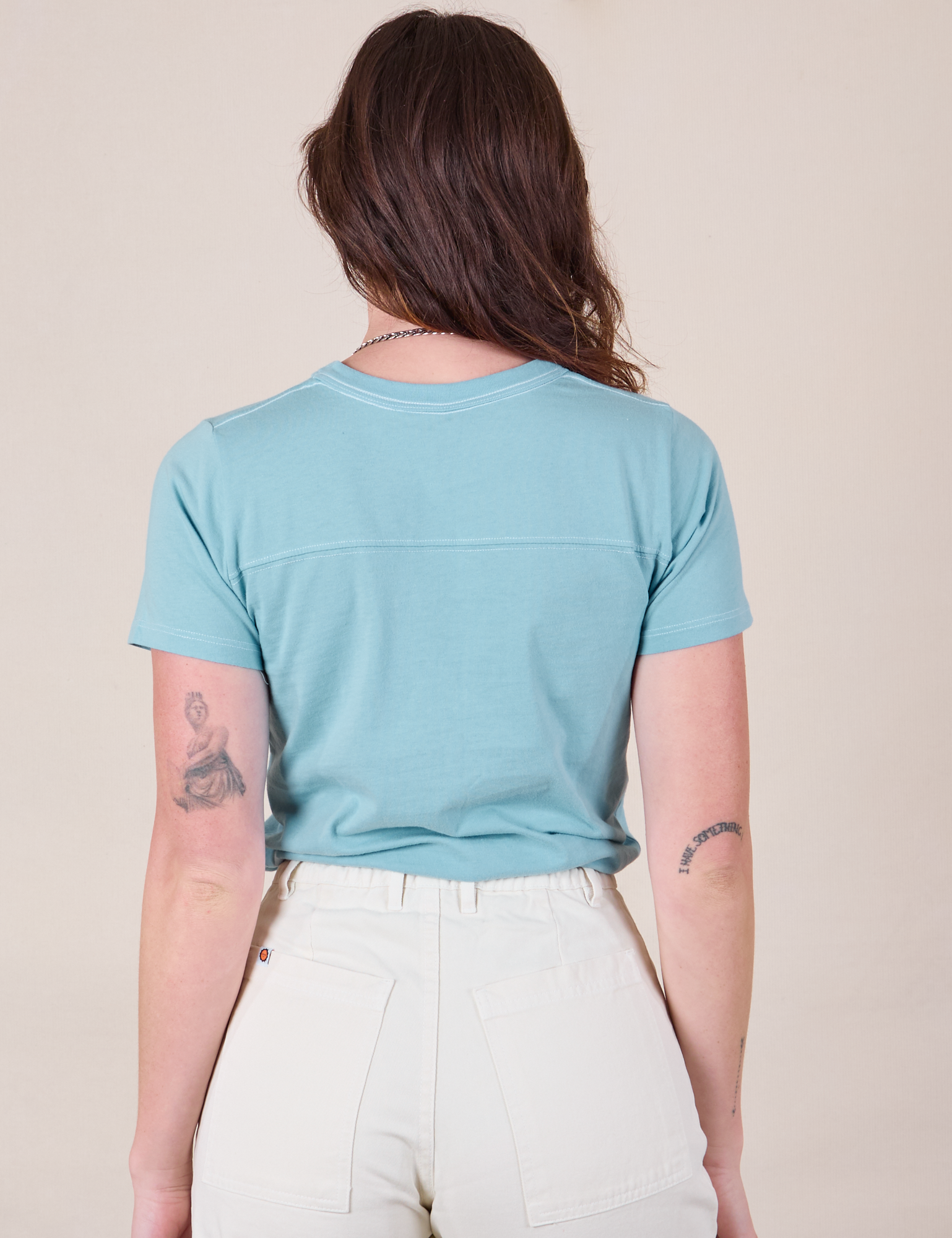 JV Tee in Baby Blue back view on Alex