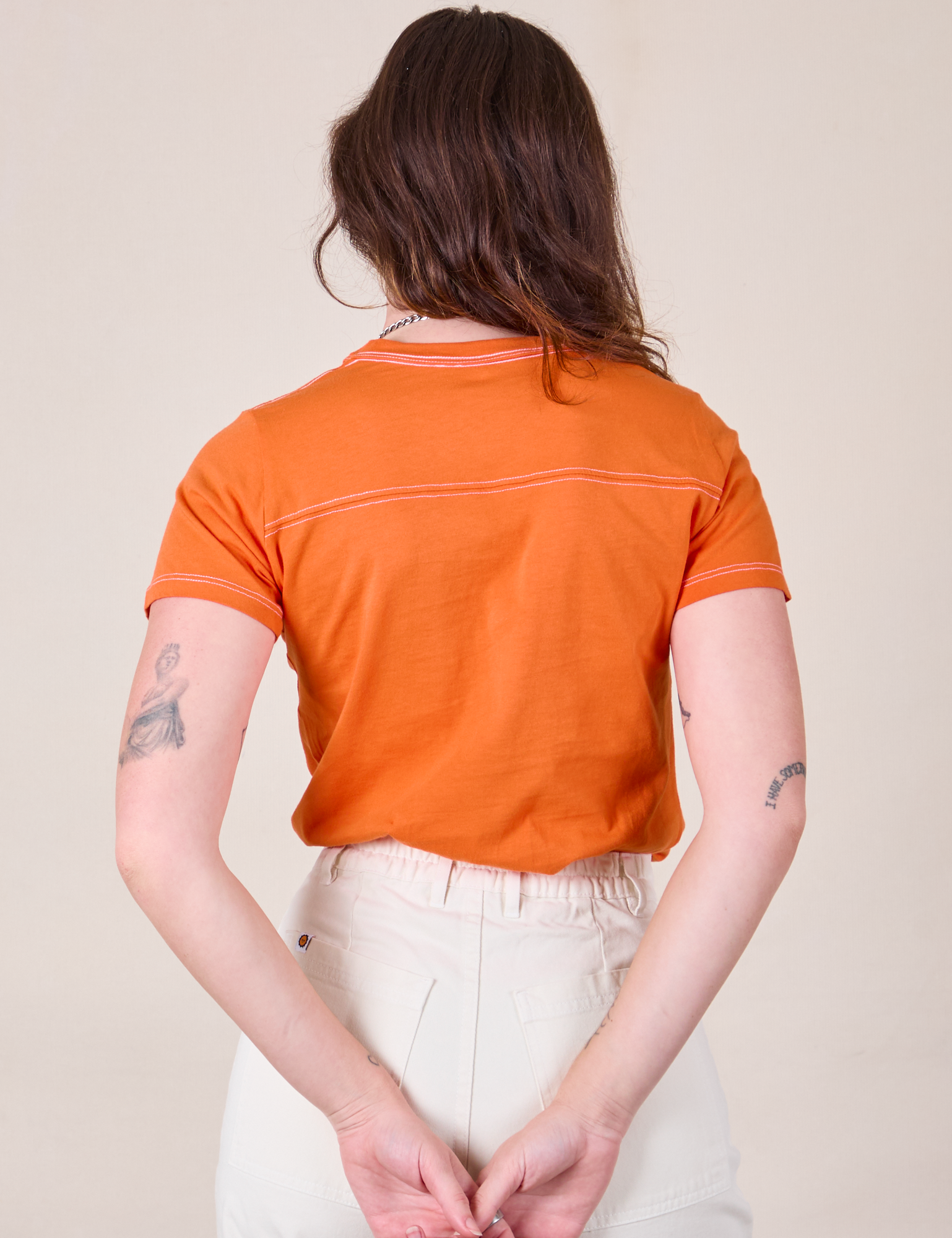 JV Tee in Construction Orange back view on Alex