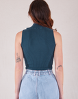 Sleeveless Essential Turtleneck in Lagoon back view on Alex