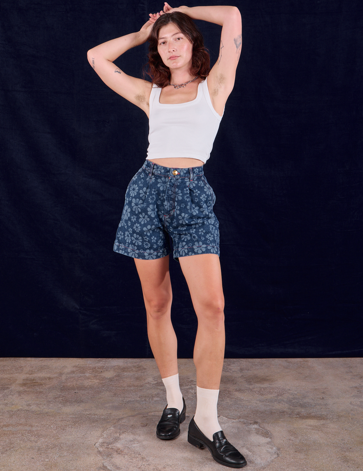 Alex is wearing Lazy Daisy Denim Shorts and Square Neck Tank in vintage tee off-white